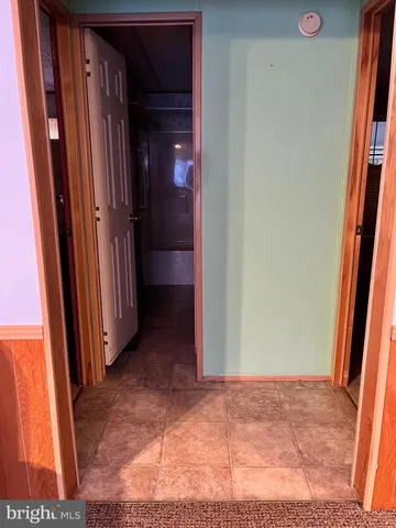 a bathroom with a sink a toilet and bathtub