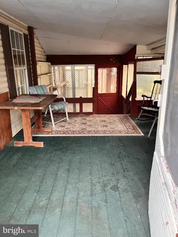 a room with furniture and a window