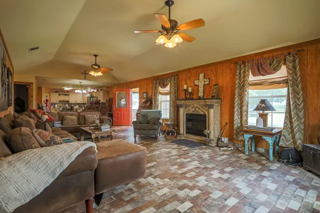 a kitchen with stainless steel appliances a refrigerator sink and cabinets