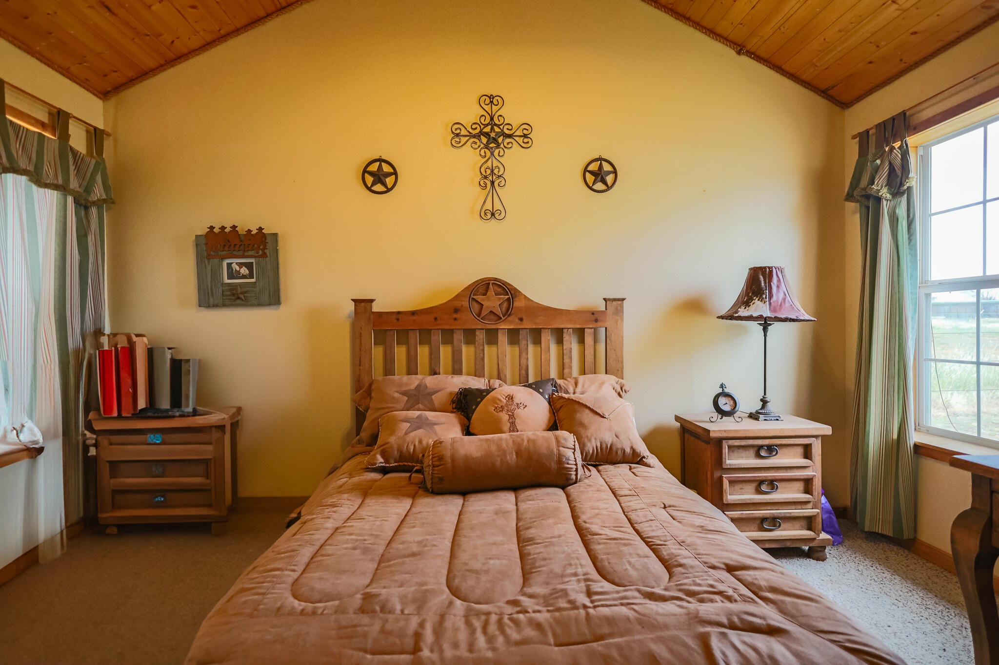 3401 East Regis Street Lubbock, TX 79403 - Photo 24 of 65 a bedroom with a bed and a window
