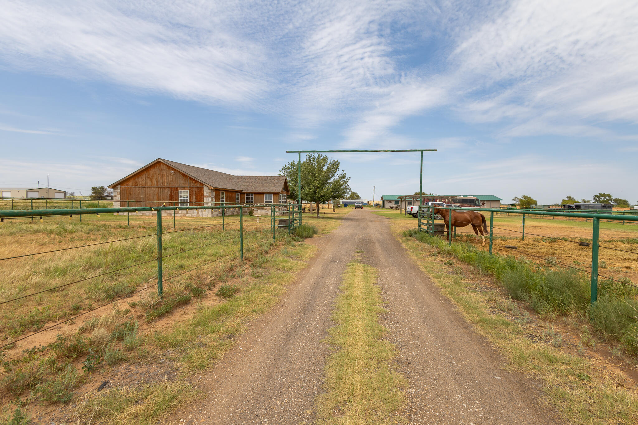 3401 East Regis Street Lubbock, TX 79403 - Photo 3 of 65 a view of a lake with a yard