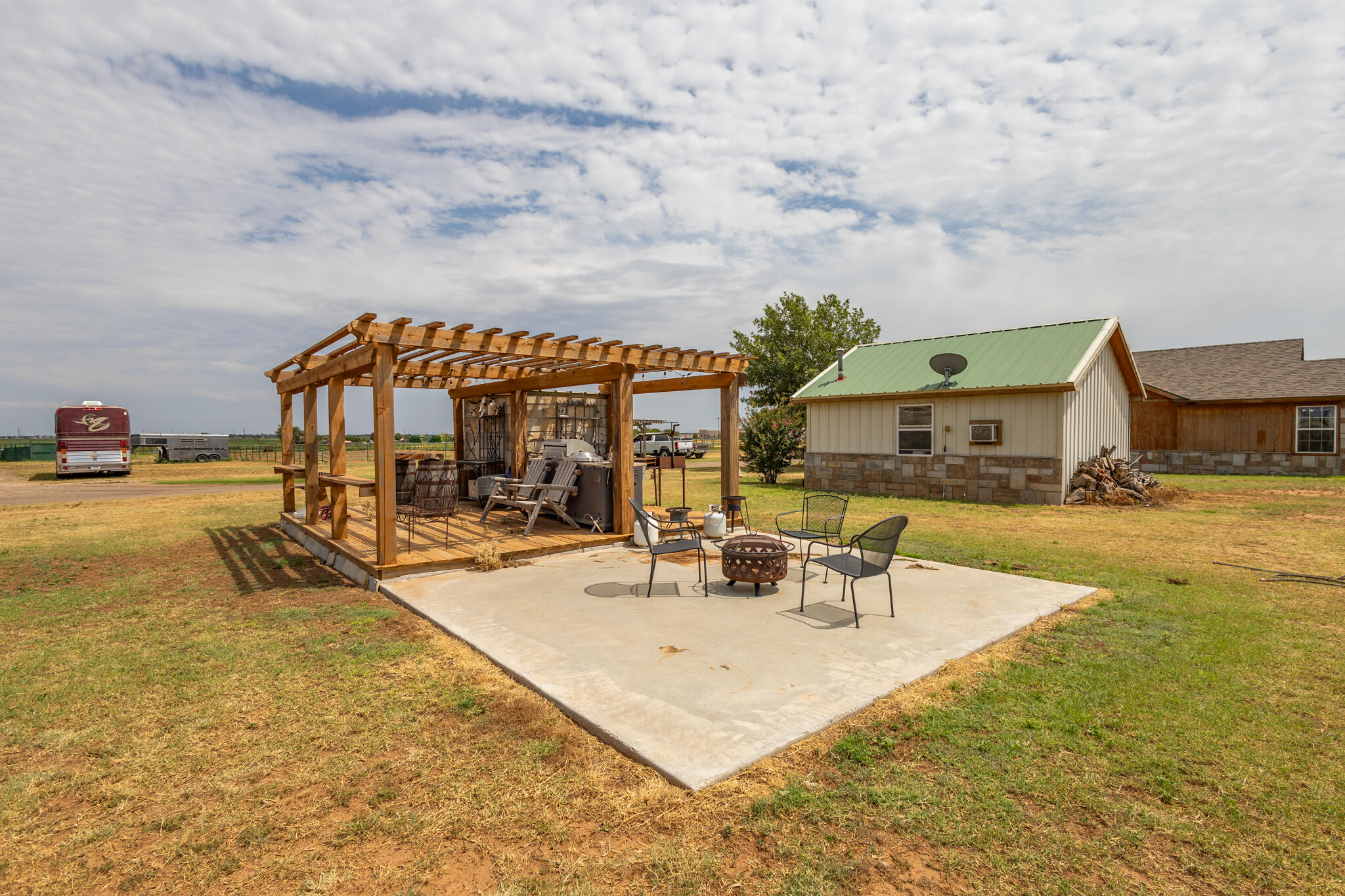 3401 East Regis Street Lubbock, TX 79403 - Photo 33 of 65 a view of a house with swimming pool and sitting area