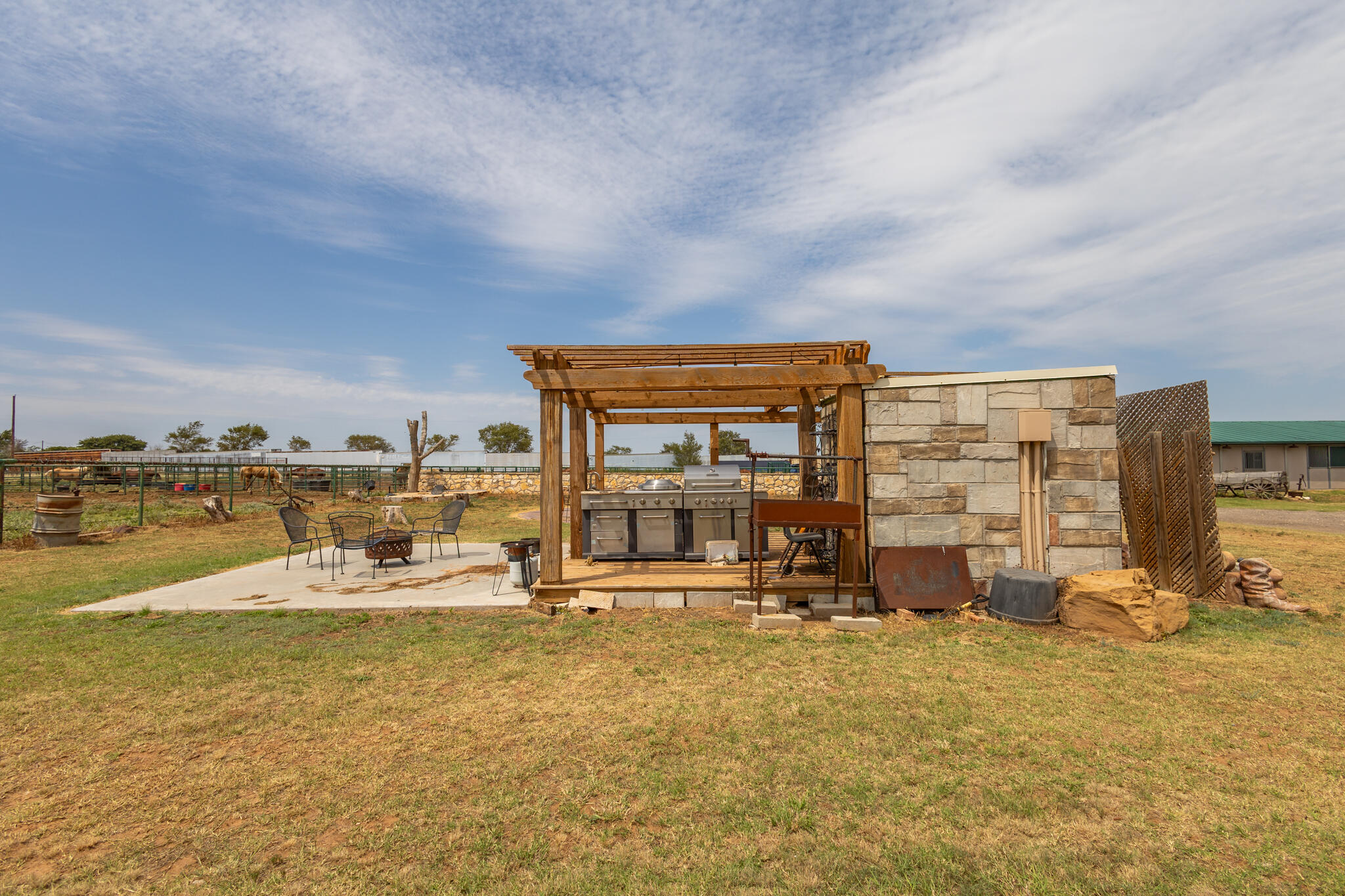 3401 East Regis Street Lubbock, TX 79403 - Photo 37 of 65 a view of a swimming pool with an outdoor seating space