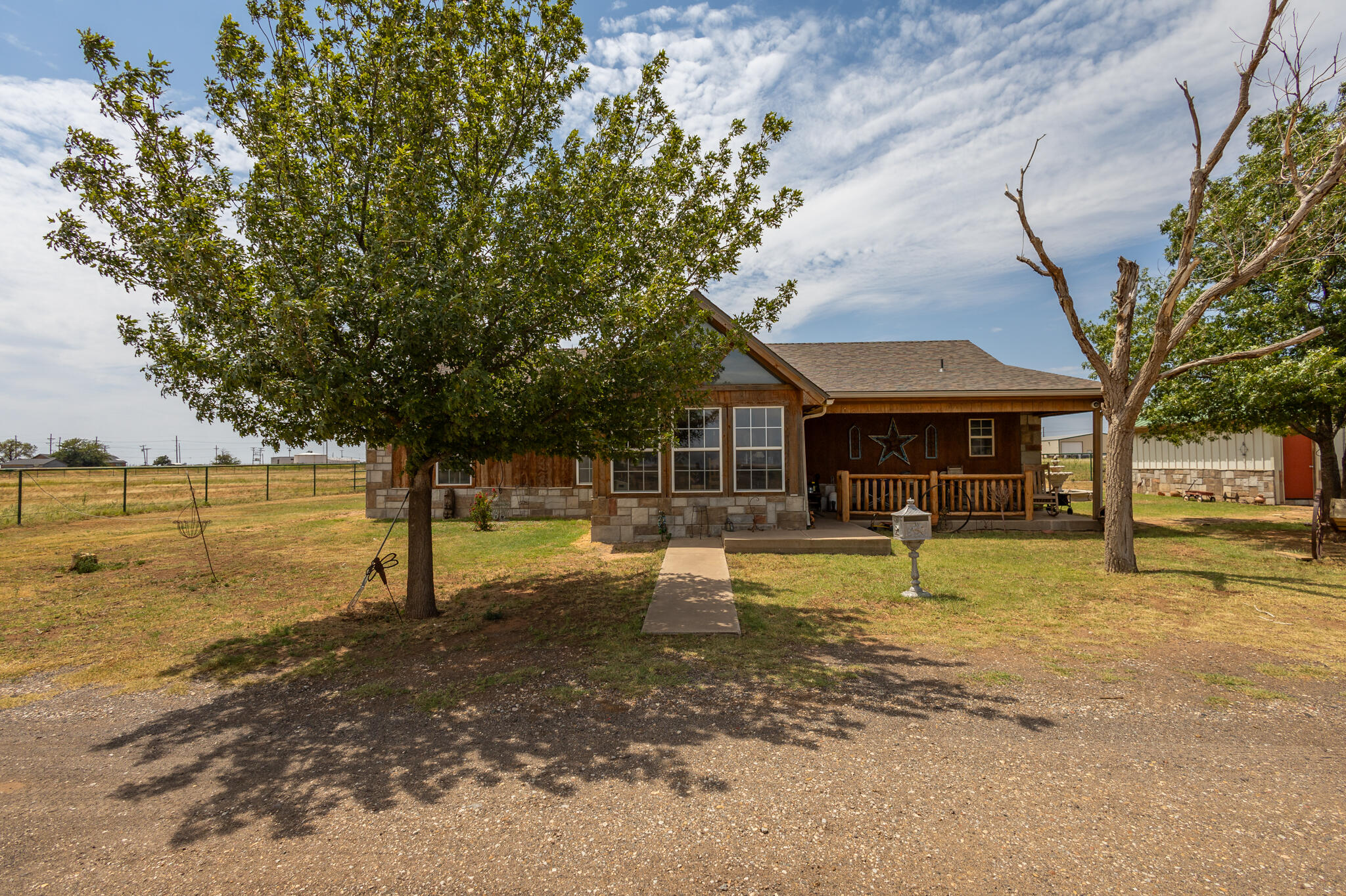 3401 East Regis Street Lubbock, TX 79403 - Photo 6 of 65 a view of a house with backyard space