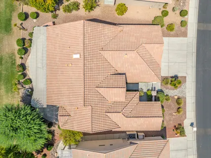 a view of a balcony with chairs