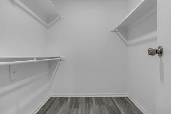 a view of a room with racks on the wall