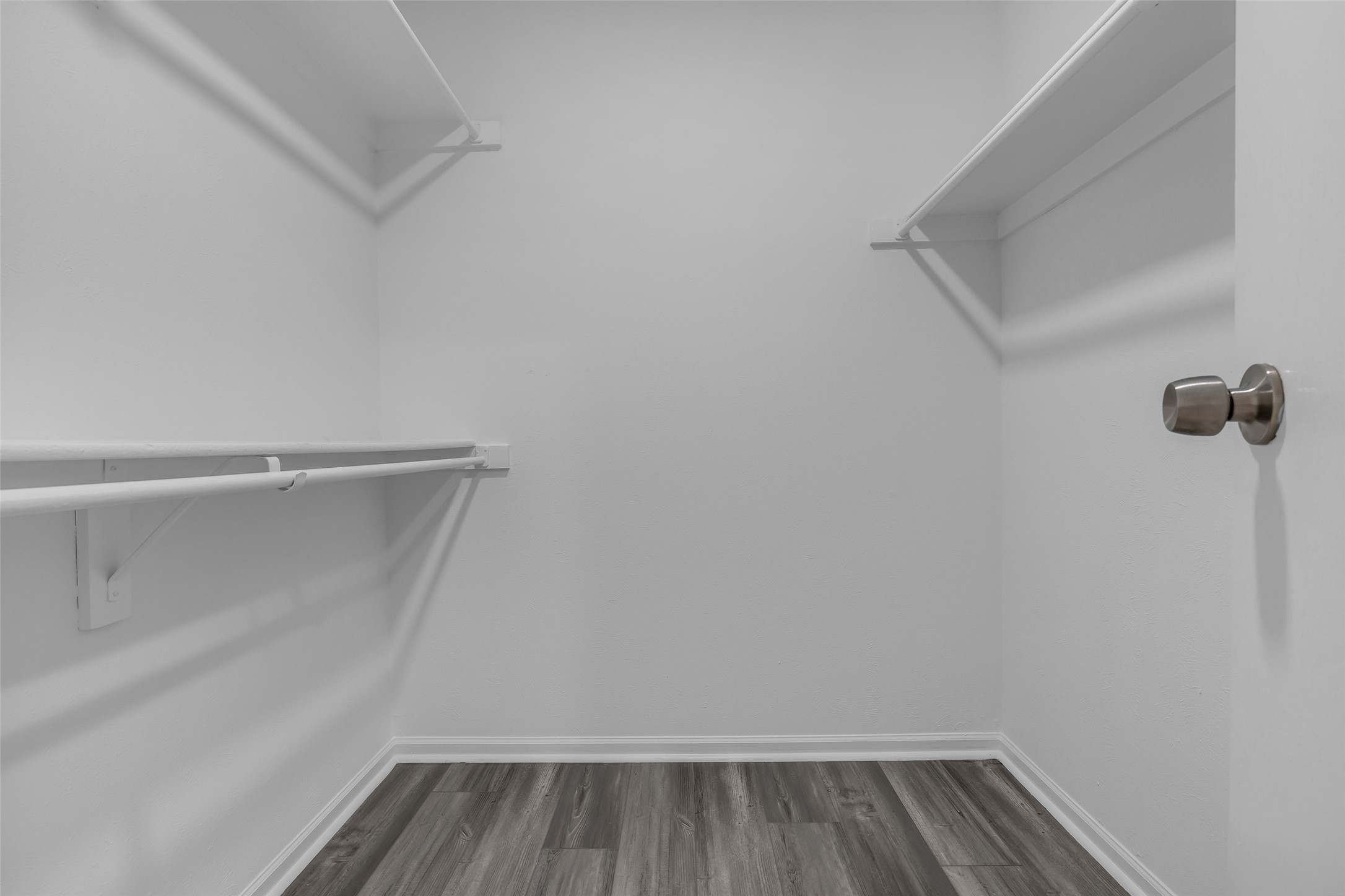 8 Still Glen Court Spring, TX 77381 - Photo 16 of 23 a view of a room with racks on the wall