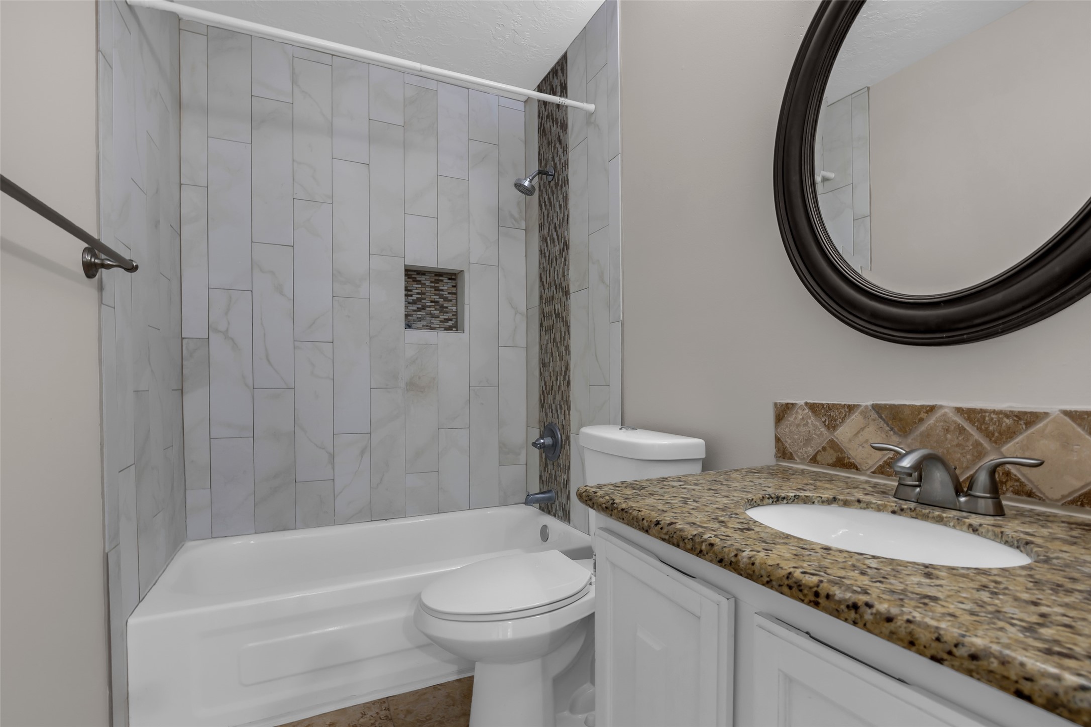 8 Still Glen Court Spring, TX 77381 - Photo 19 of 23 a bathroom with a granite countertop sink and a mirror