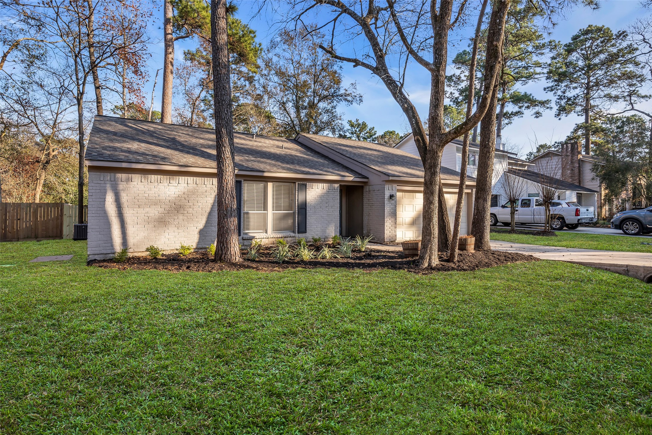 8 Still Glen Court Spring, TX 77381 - Photo 2 of 23 a view of a back yard of the house