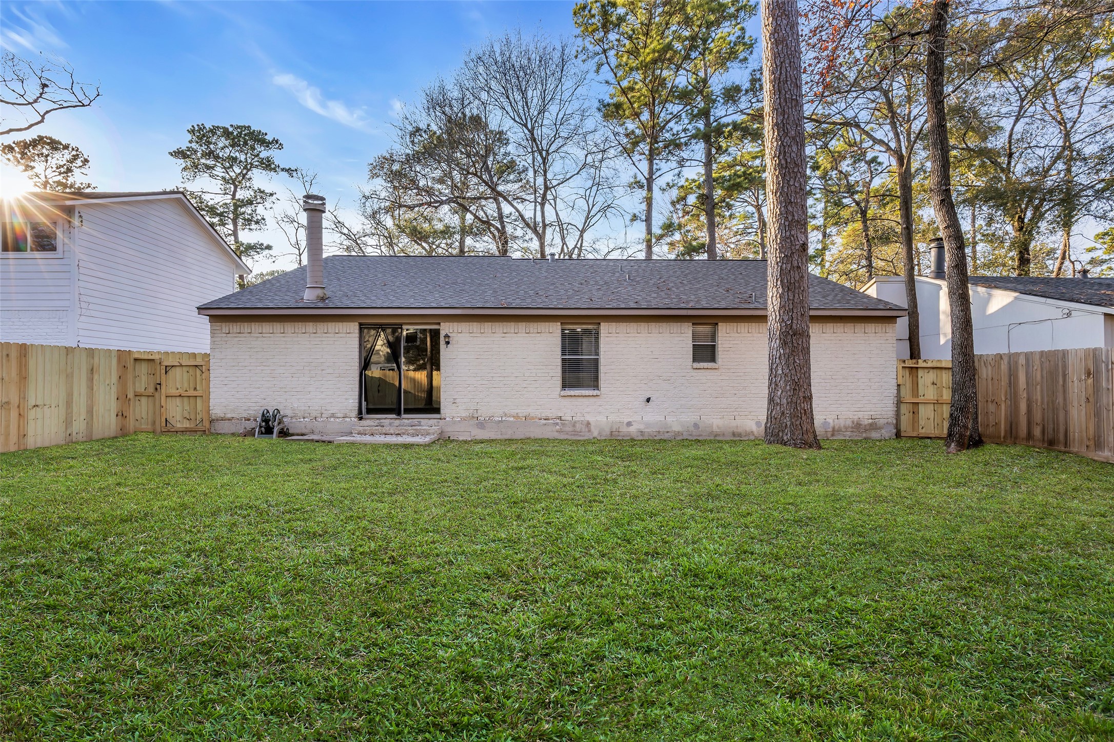 8 Still Glen Court Spring, TX 77381 - Photo 22 of 23 a view of a house with backyard and garden