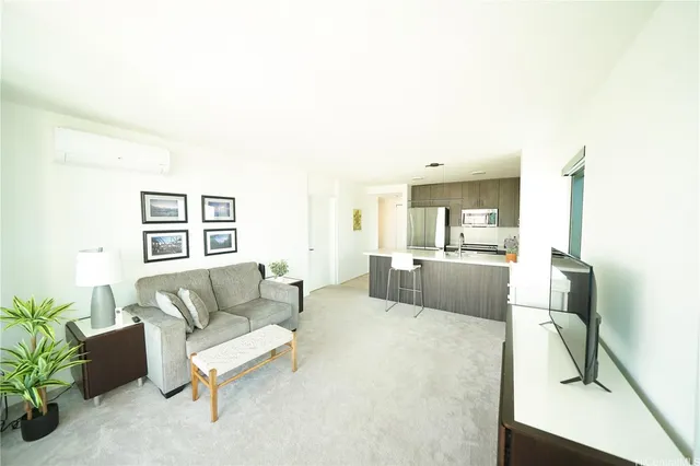 a living room with furniture and a couch