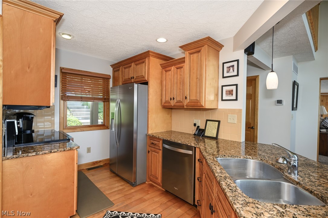 2873 Lodge Road Southwest Sherrodsville, OH 44675 - Photo 21 of 50 All new kitchen appliances are ready to provide years of reliable service.