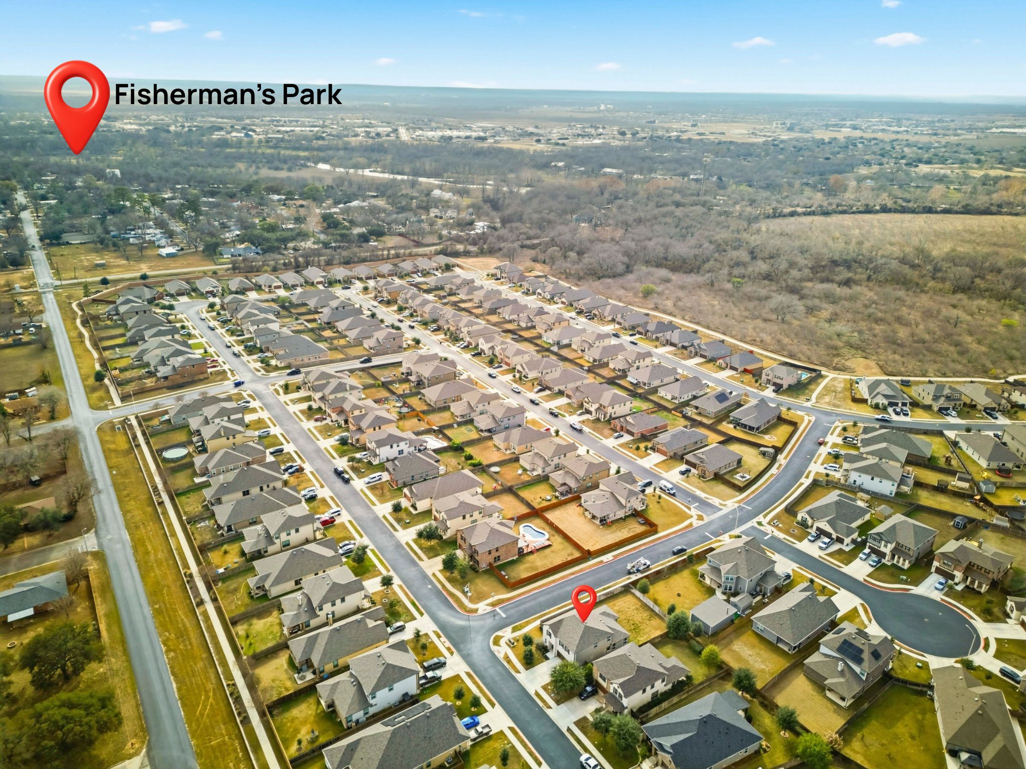 1506 Dragonfly Loop Bastrop, TX 78602 - Photo 28 of 28 Aerial view of property's location with nearby suburban area