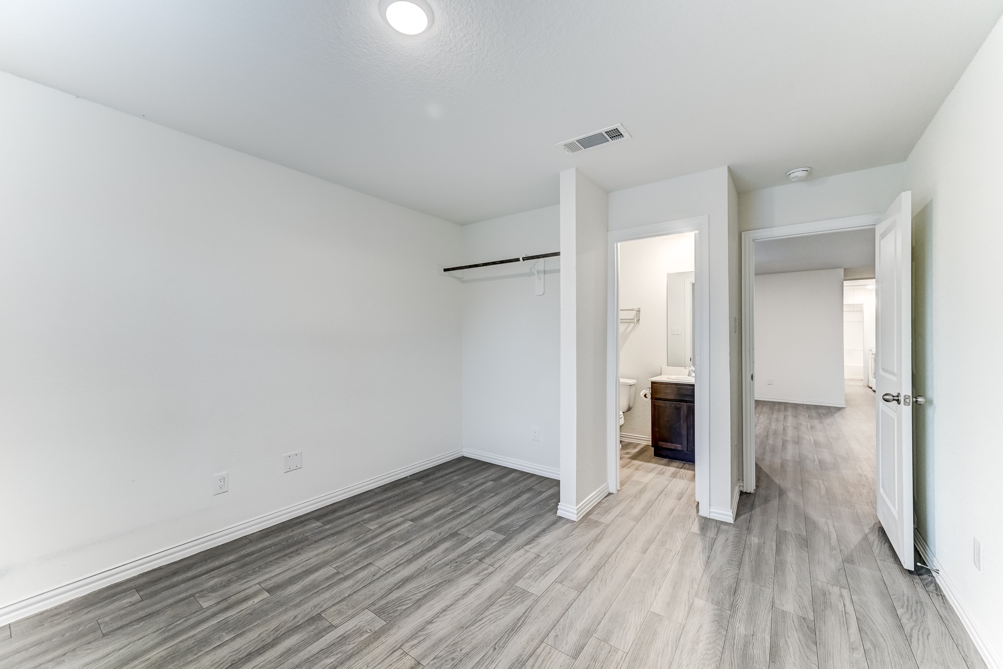 7925 Way Street, Unit A Houston, TX 77028 - Photo 15 of 29 a view of a room with wooden floor and a bathroom