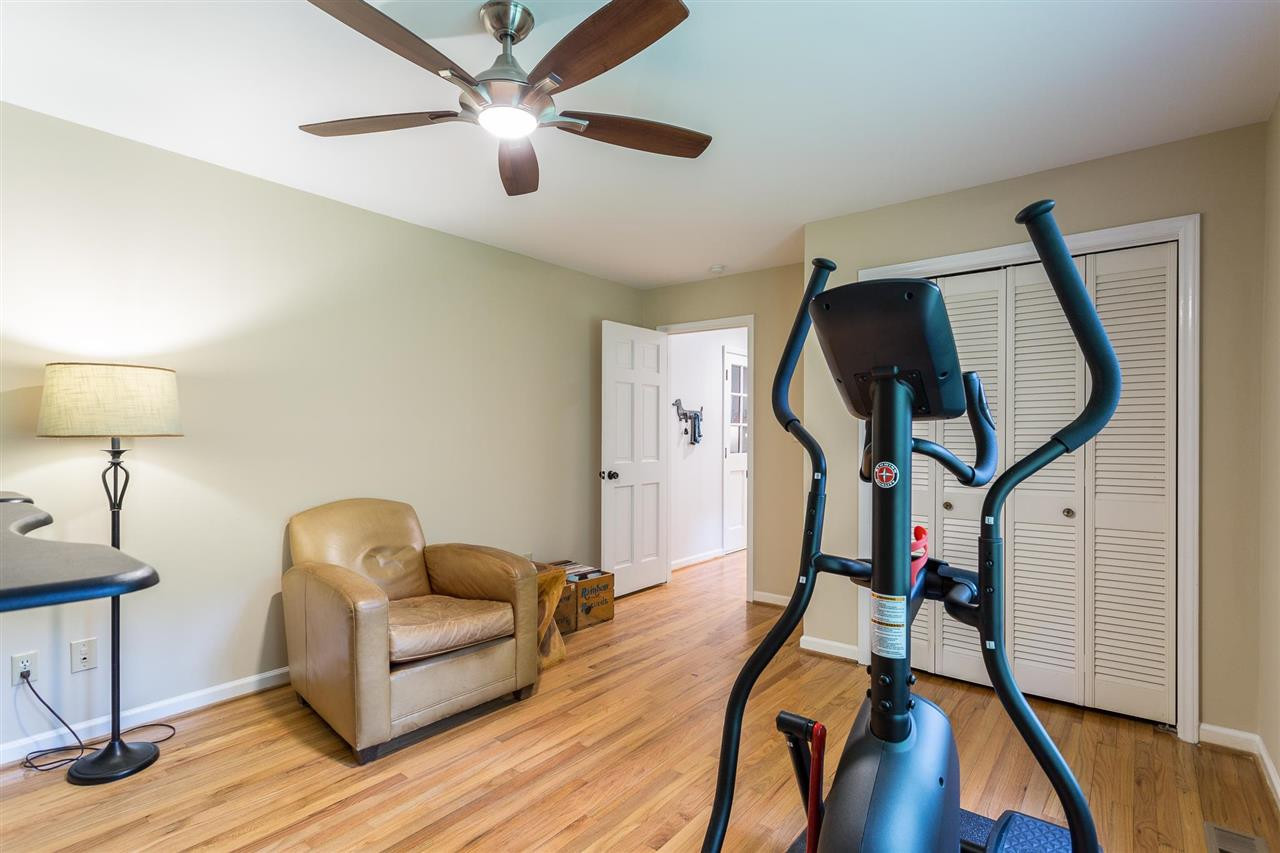 7809 Harps Mill Road Raleigh, NC 27615 - Photo 17 of 30 This versatile space with hardwood floors can be used as an exercise room, home office, playroom or bedroom. Flexible 1st Floor Bedroom
