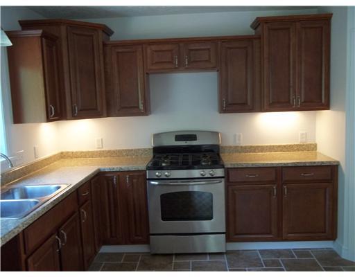 Exterior Front. Gas stainless steel range.
