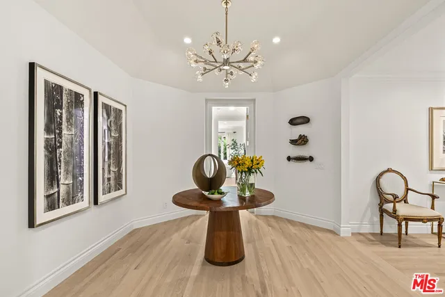 a view of a livingroom with furniture and wooden floor