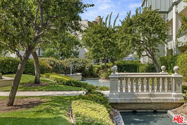 a view of a deck with a yard