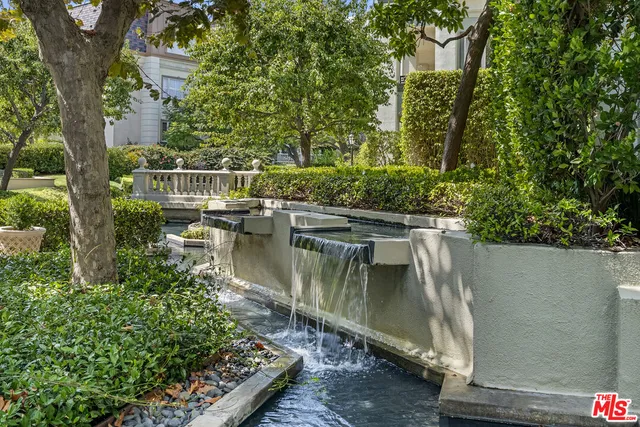 a view of a lake with a house in the background