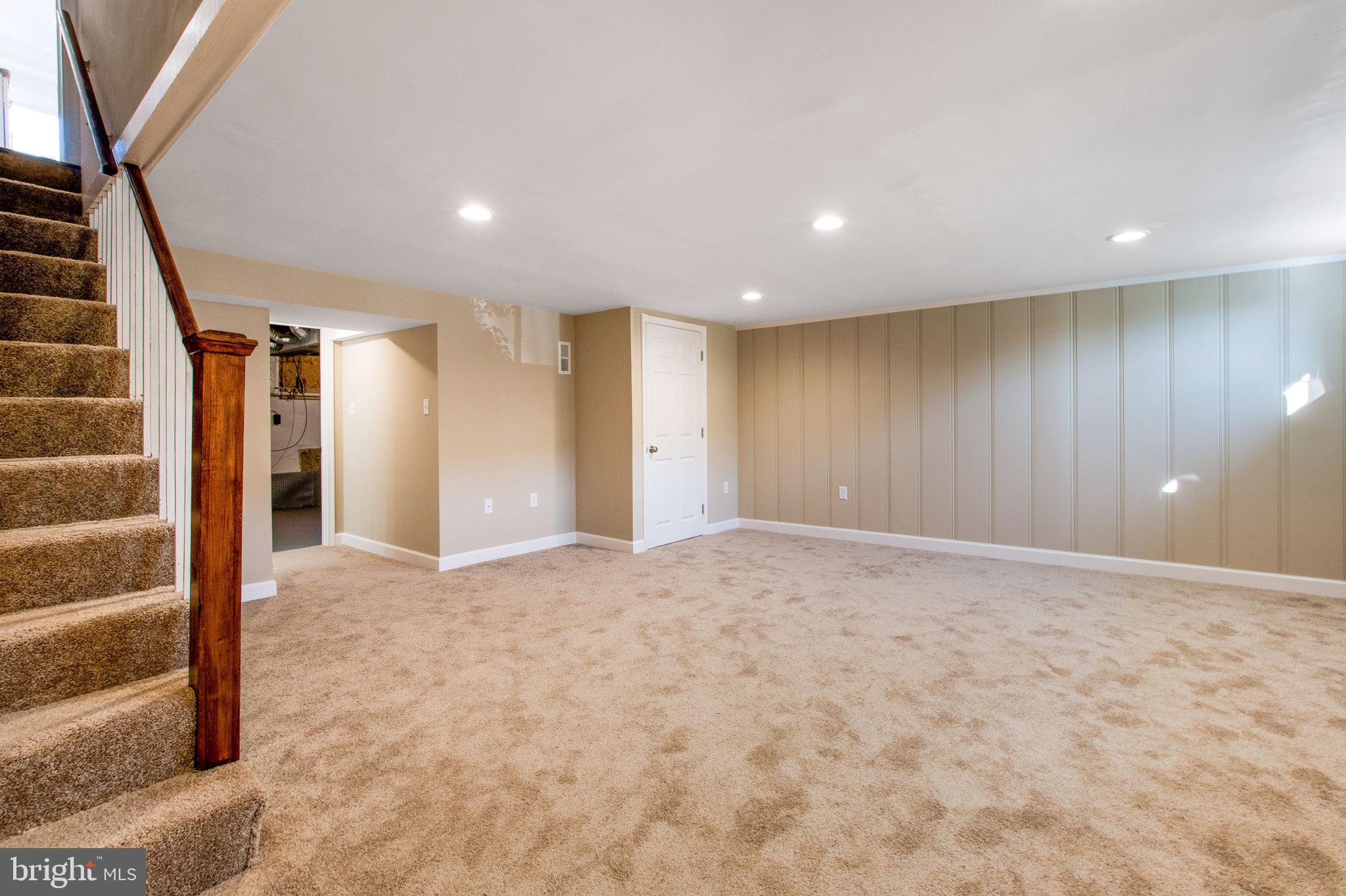 1502 Tunlaw Road Baltimore, MD 21218 - Photo 21 of 27 Family Room/Lower Level
