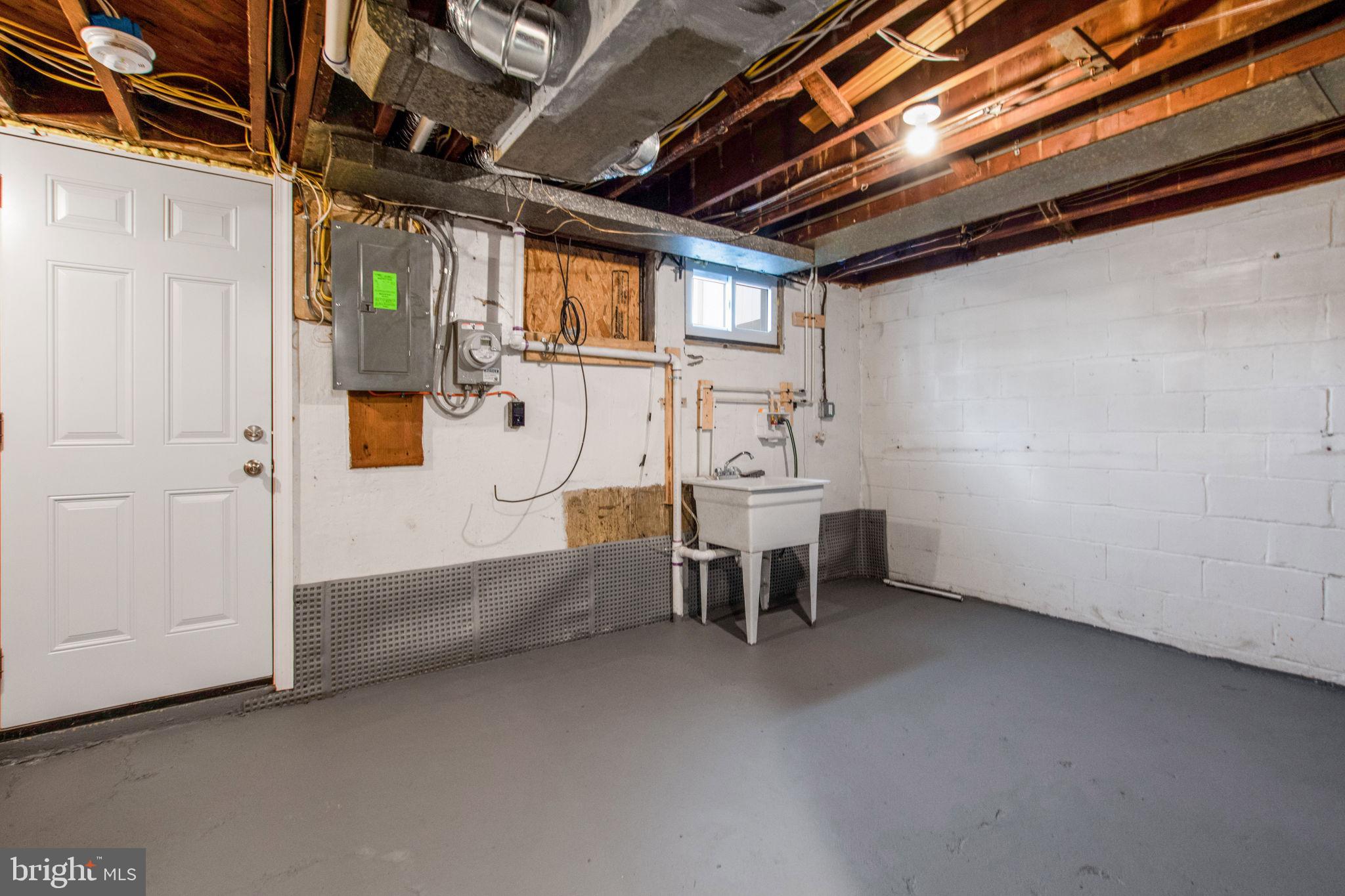 1502 Tunlaw Road Baltimore, MD 21218 - Photo 24 of 27 Laundry/Utility Room