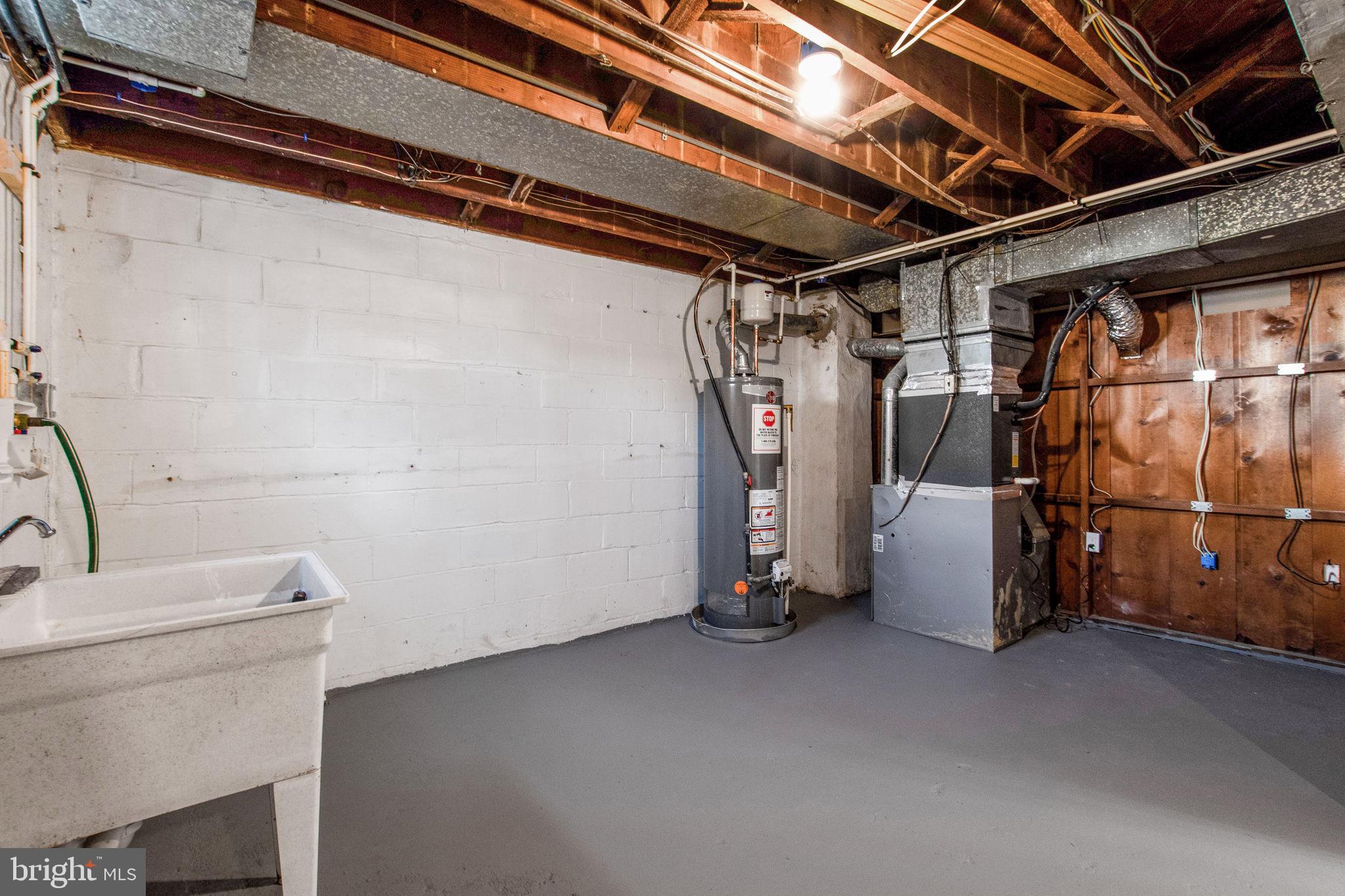 1502 Tunlaw Road Baltimore, MD 21218 - Photo 25 of 27 Laundry/Utility Room