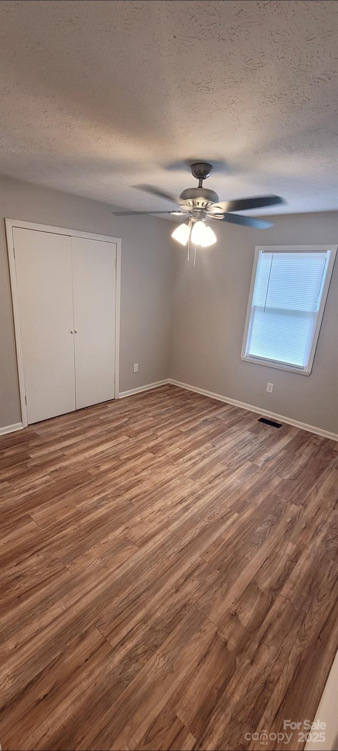 2696 Tablerock Road Lenoir, NC 28645 - Photo 12 of 36 wooden floor in an empty room