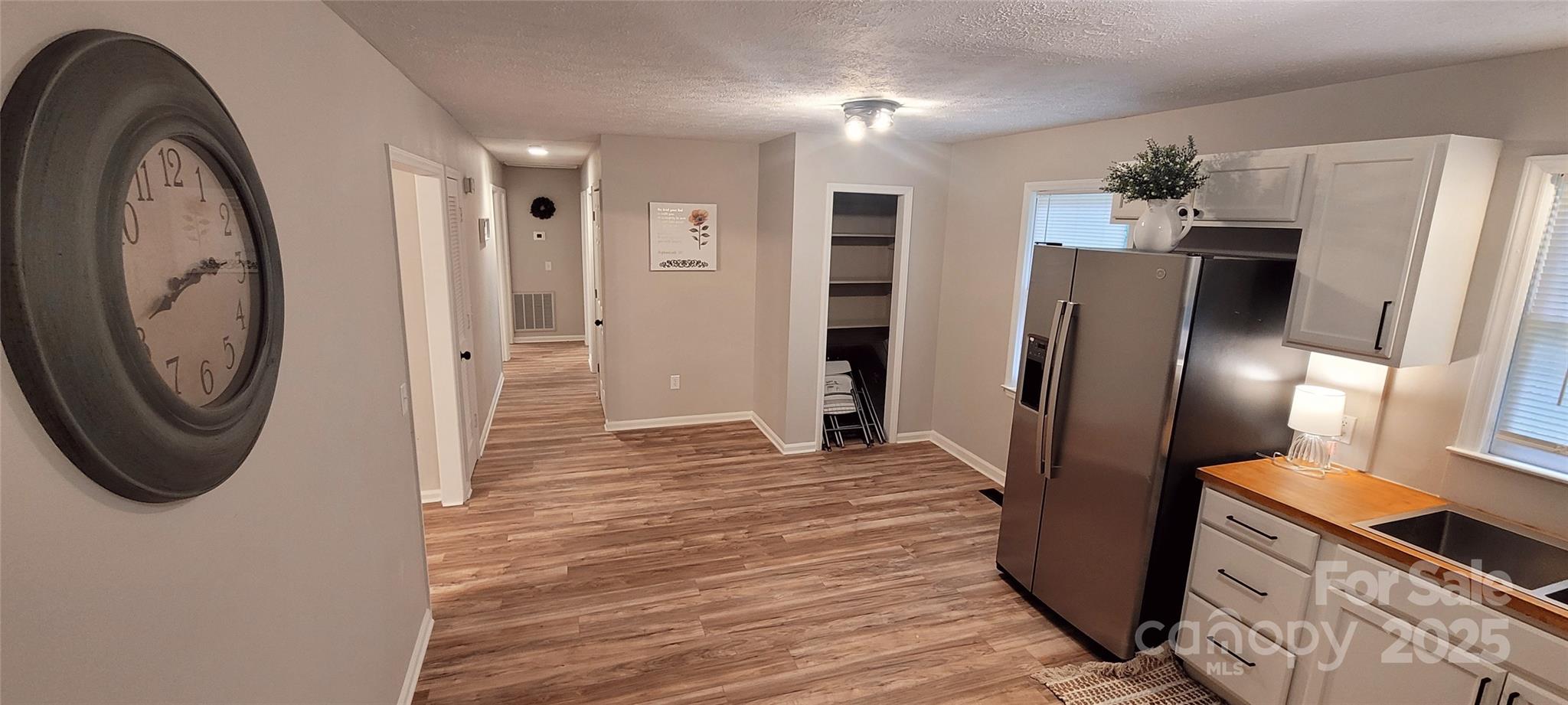 2696 Tablerock Road Lenoir, NC 28645 - Photo 21 of 36 a view of a kitchen with stainless steel appliances granite countertop a refrigerator and a stove