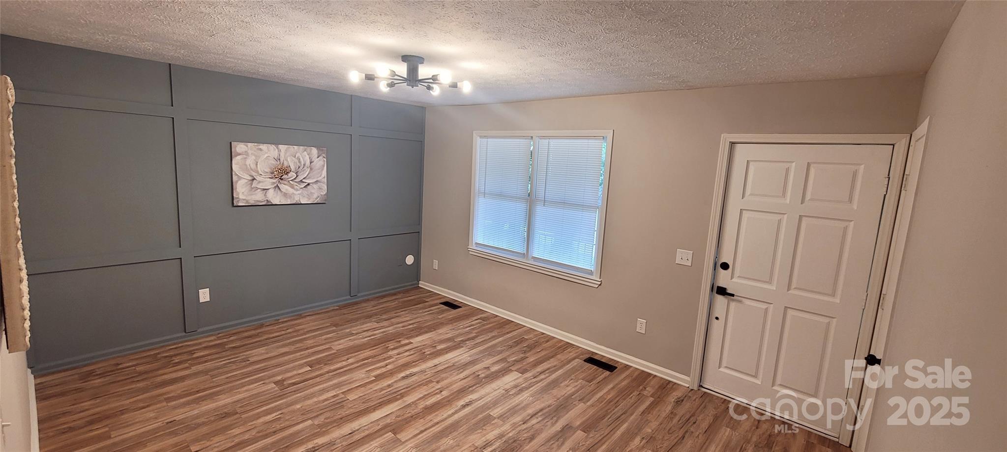 2696 Tablerock Road Lenoir, NC 28645 - Photo 9 of 36 a view of a room with wooden floor