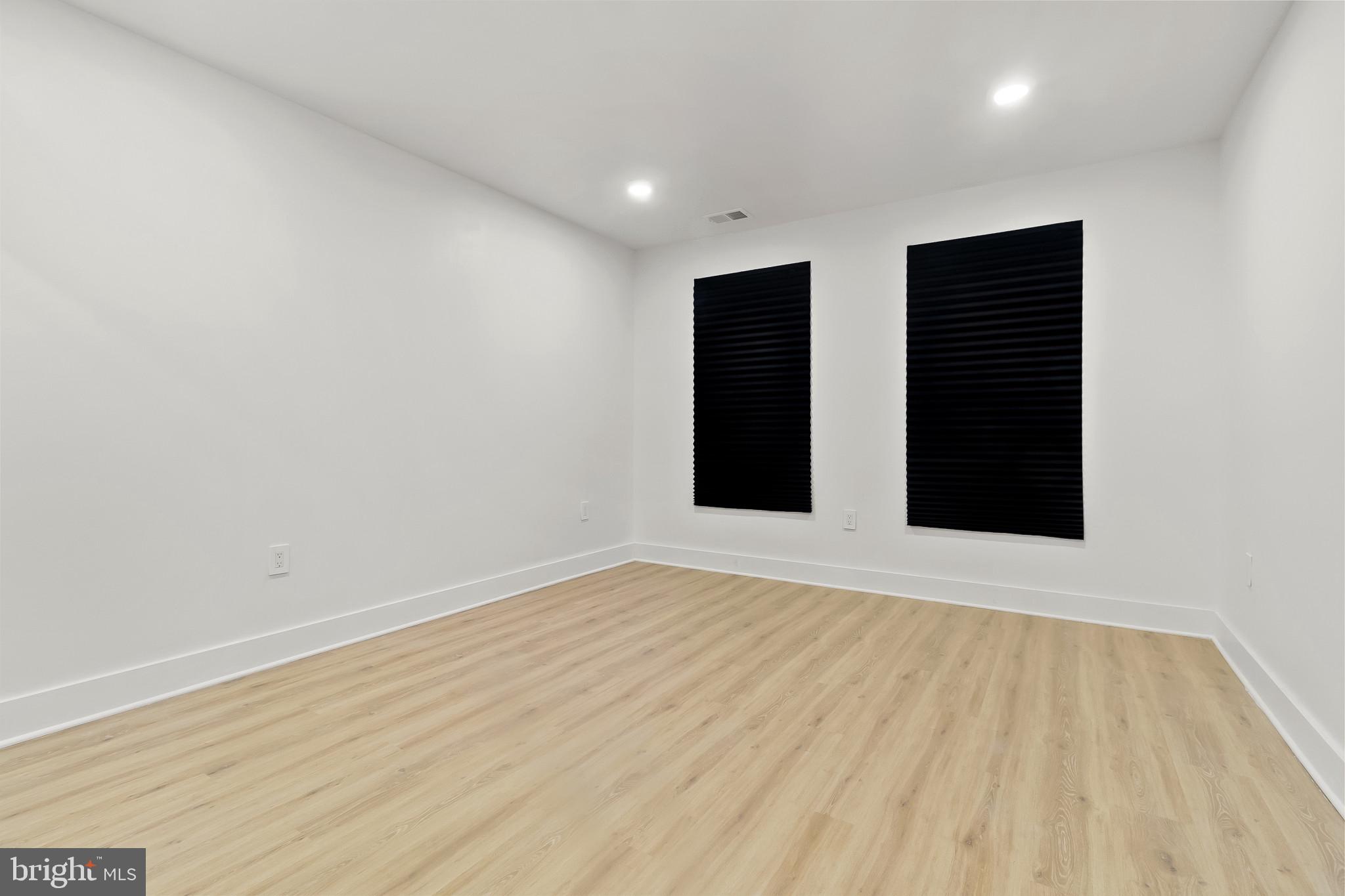 5214 Jefferson Street Philadelphia, PA 19131 - Photo 19 of 28 a view of an empty room with wooden floor