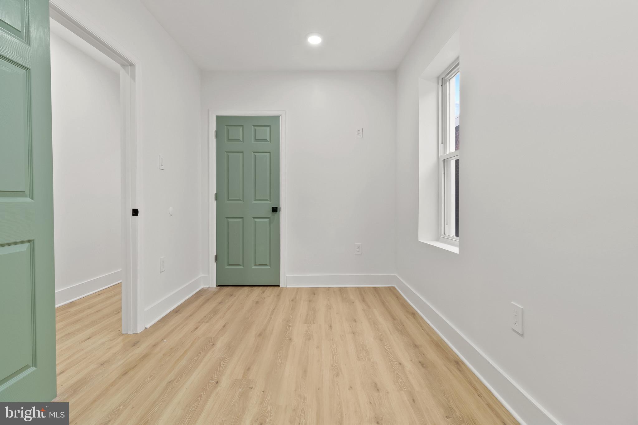 5214 Jefferson Street Philadelphia, PA 19131 - Photo 21 of 28 a view of a room with wooden floor and a window
