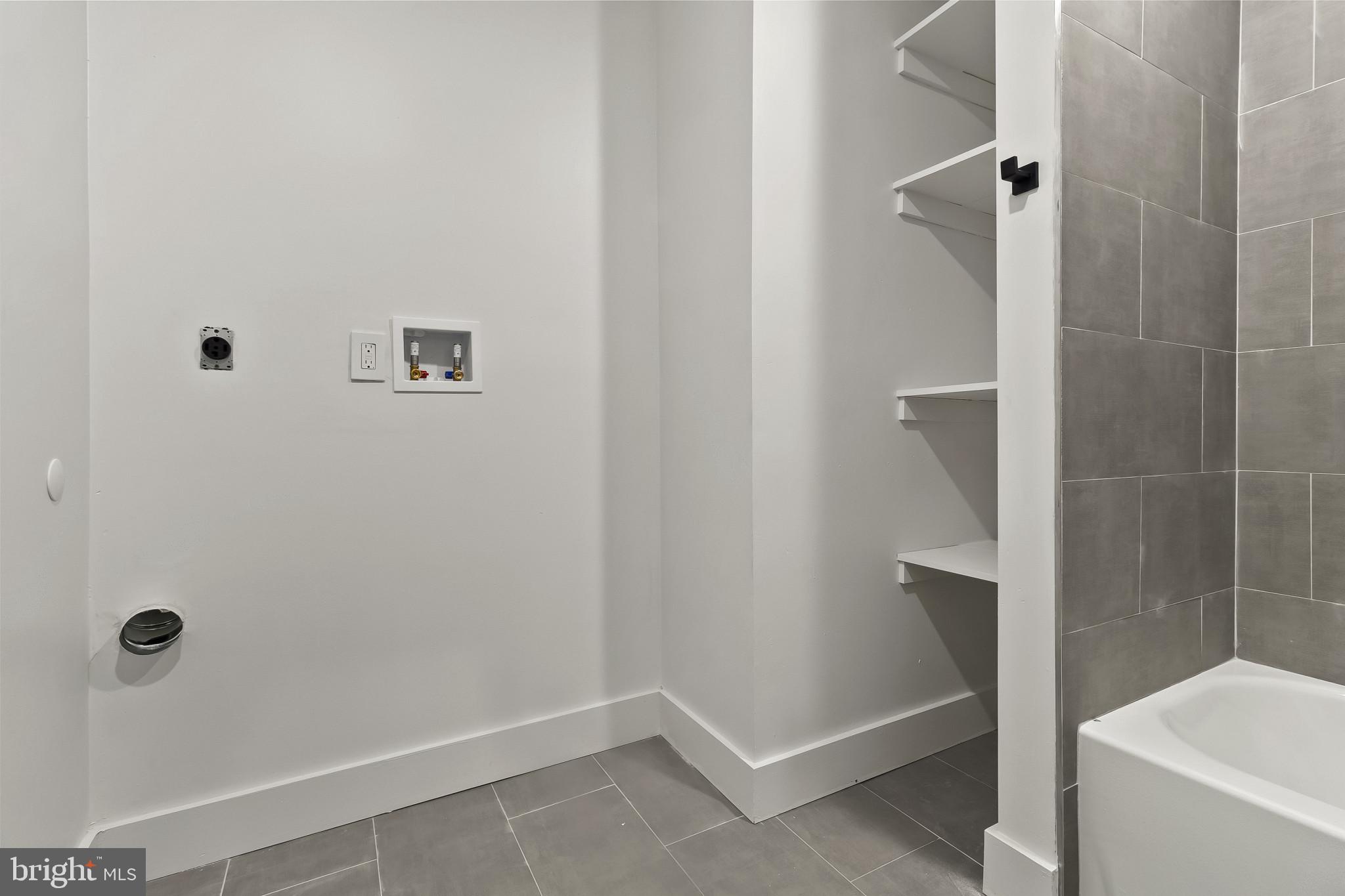5214 Jefferson Street Philadelphia, PA 19131 - Photo 24 of 28 a bathroom with a bathtub