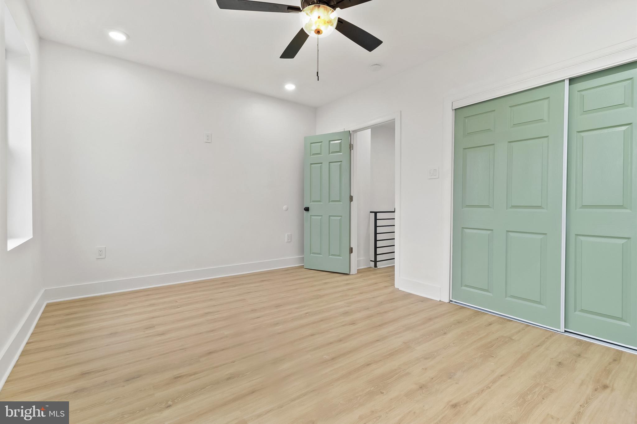 5214 Jefferson Street Philadelphia, PA 19131 - Photo 25 of 28 an empty room with fan and entrance