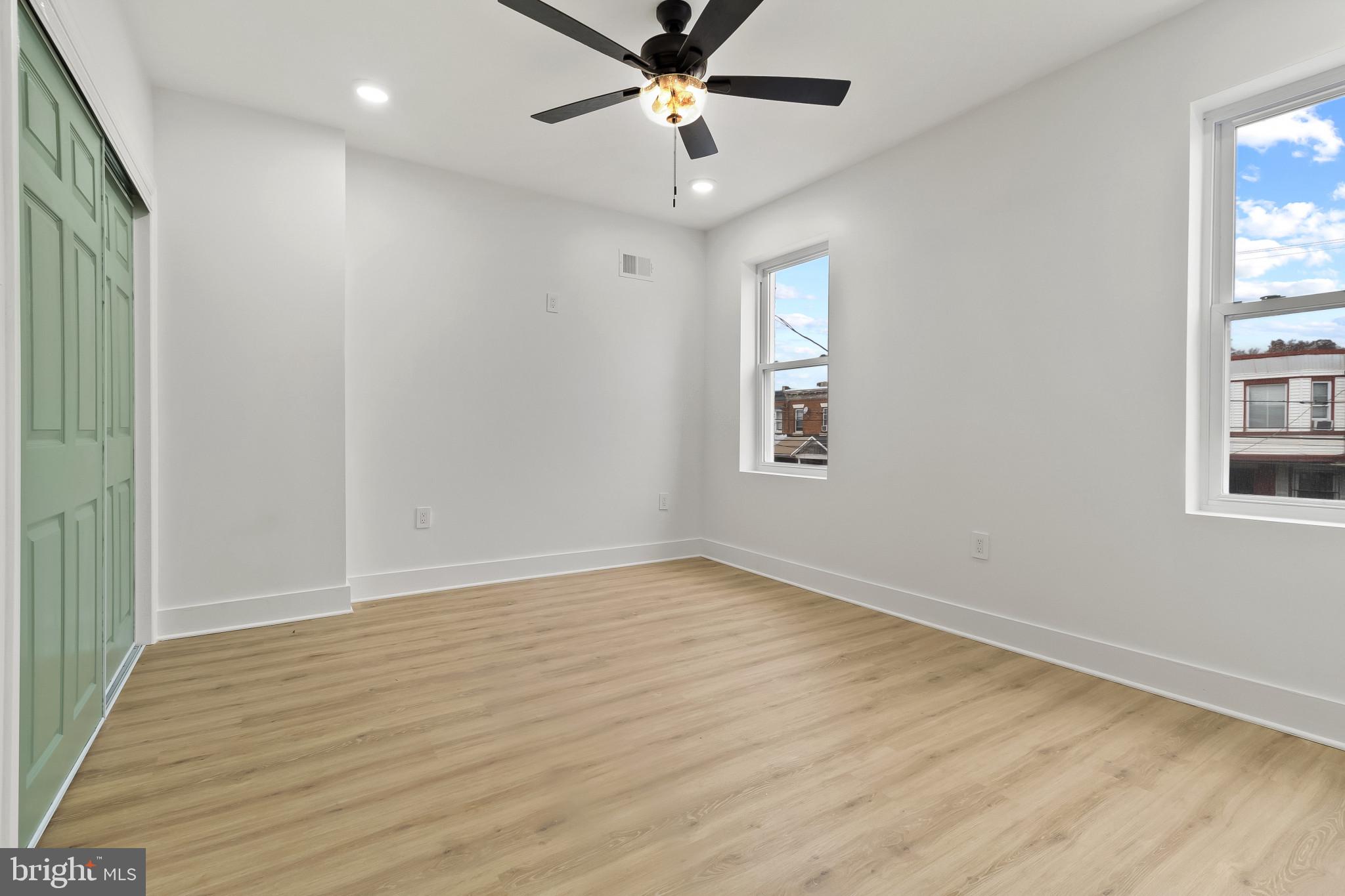 5214 Jefferson Street Philadelphia, PA 19131 - Photo 26 of 28 wooden floor in an empty room with a window