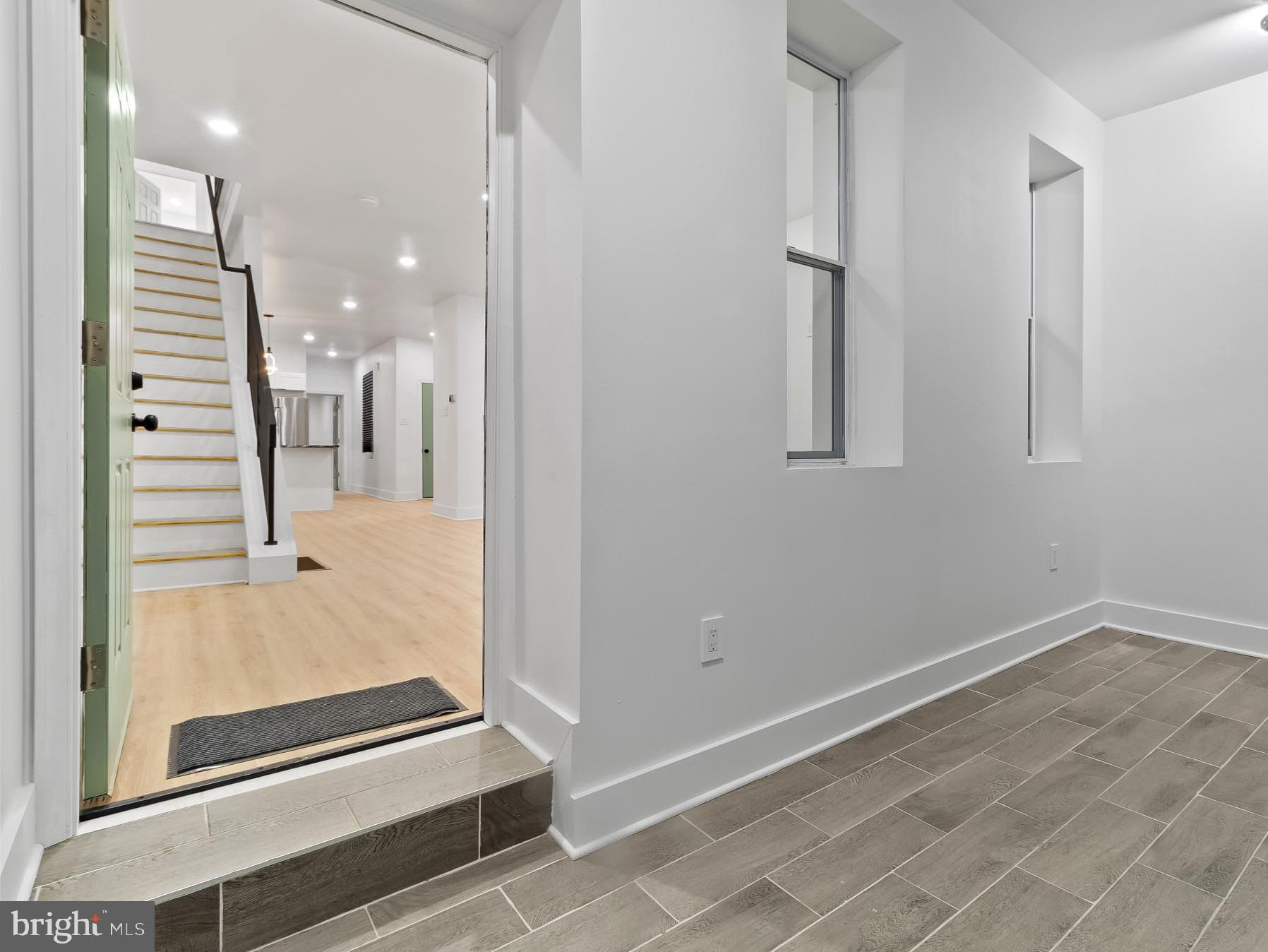 5214 Jefferson Street Philadelphia, PA 19131 - Photo 5 of 28 a view of a bathroom with a glass door shower