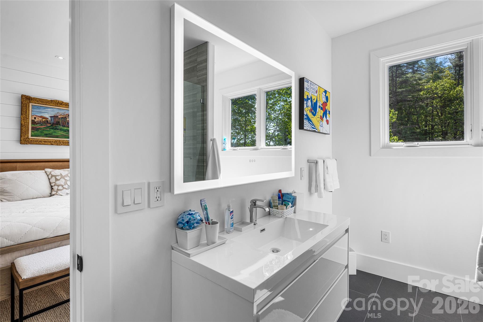 2235 Cold Mountain Road Lake Toxaway, NC 28747 - Photo 35 of 47 a bathroom with a sink and a mirror