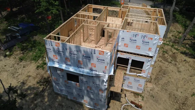 aerial view of a house with a yard