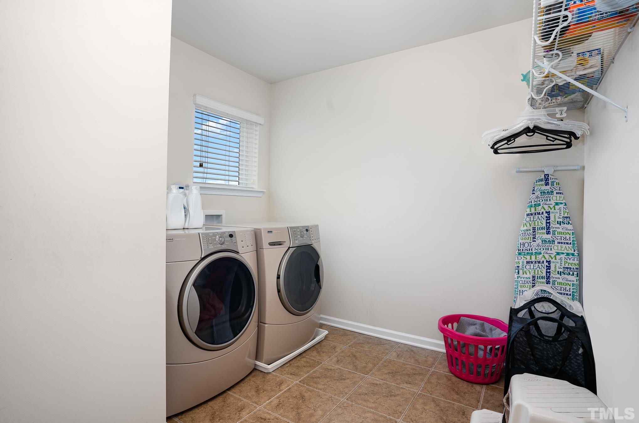 3608 Althorp Drive Raleigh, NC 27616 - Photo 20 of 25 a view of livingroom with washer and dryer