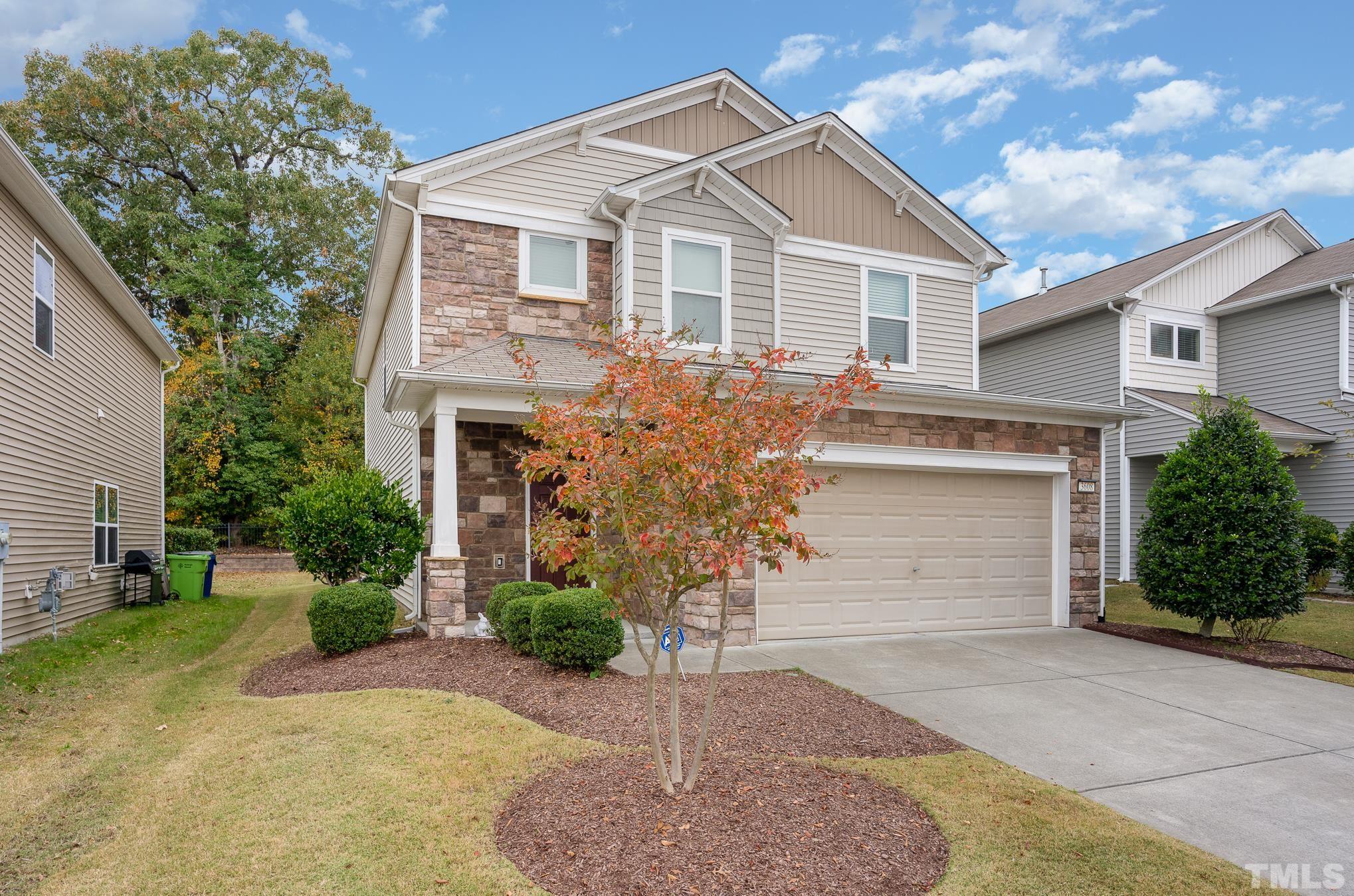 3608 Althorp Drive Raleigh, NC 27616 - Photo 2 of 25 a front view of a house with a yard and garage