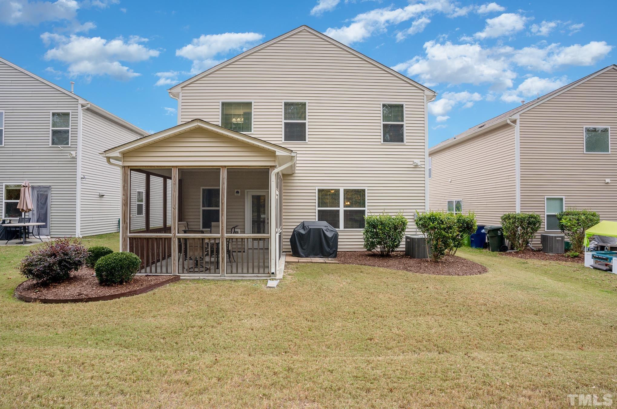 3608 Althorp Drive Raleigh, NC 27616 - Photo 22 of 25 a view of a house with backyard and porch