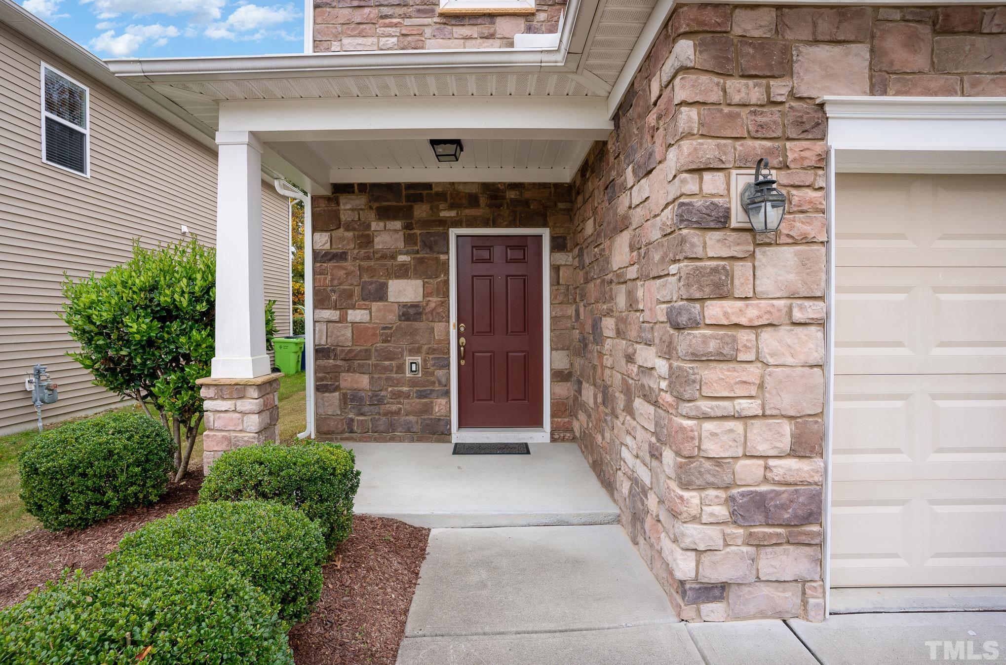 3608 Althorp Drive Raleigh, NC 27616 - Photo 3 of 25 a front view of a house with a garage
