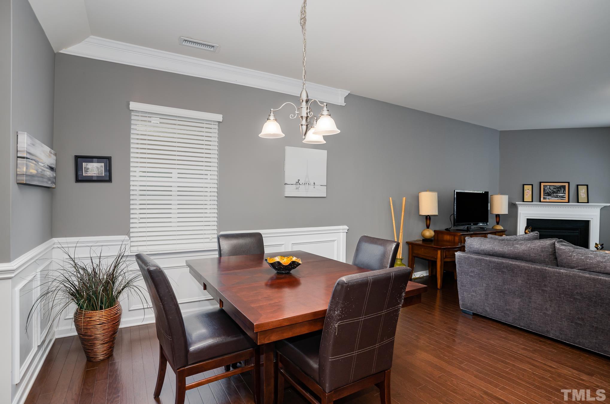3608 Althorp Drive Raleigh, NC 27616 - Photo 4 of 25 a view of a dining room with furniture and wooden floor