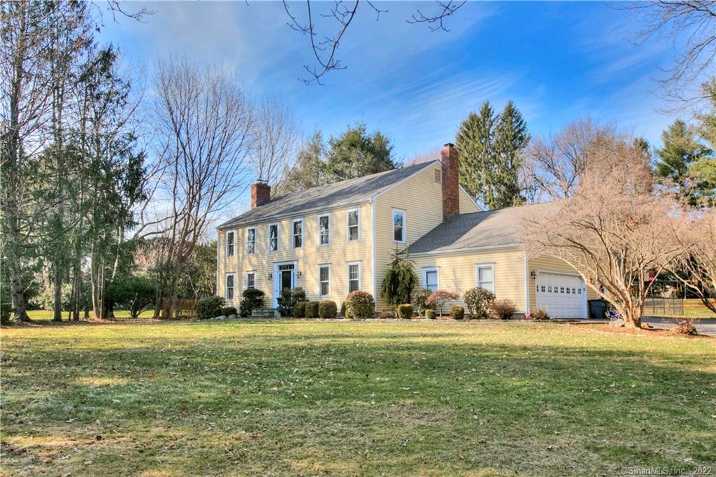 58 North Cedar Road Fairfield, CT 06824 - Photo 1 of 1 a front view of building with yard