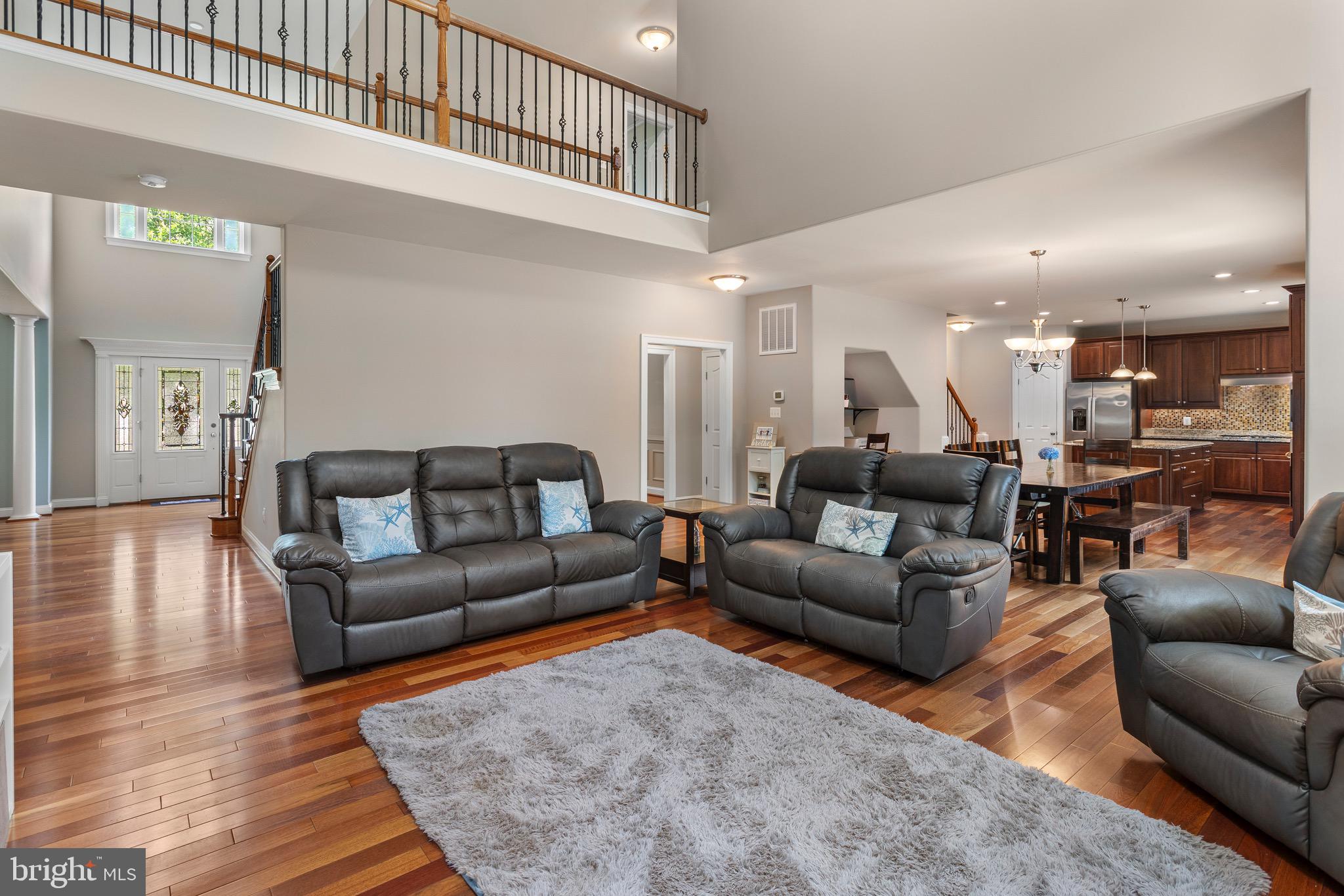 3325 Cox Road Chesapeake Beach, MD 20732 - Photo 32 of 127 Open Family Room to the upper level