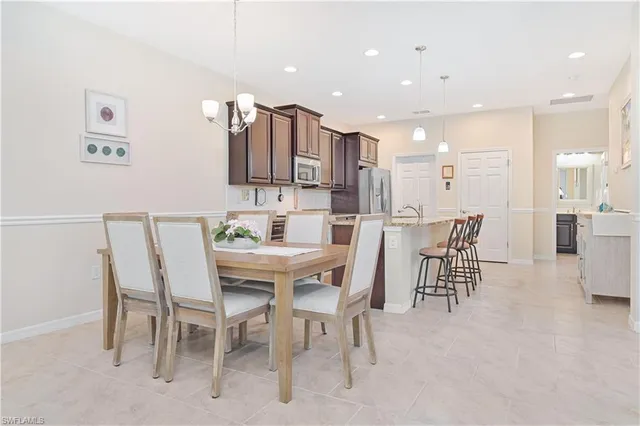 a spacious bedroom with a bed and a window