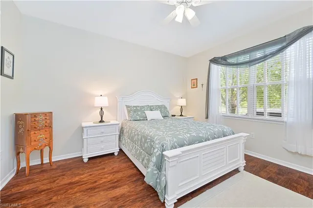 a spacious bathroom with a double vanity sink mirror and shower