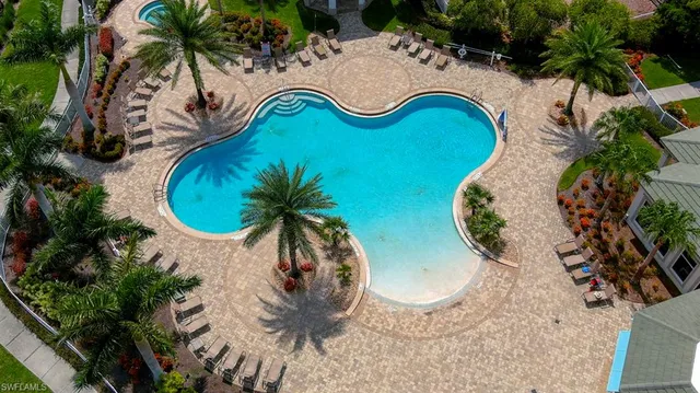 a view of a golf course with a lake view