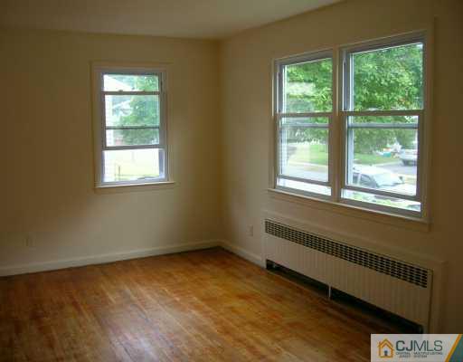 270 Old Post Road Edison, NJ 08817 - Photo 3 of 8 a view of an empty room with a window