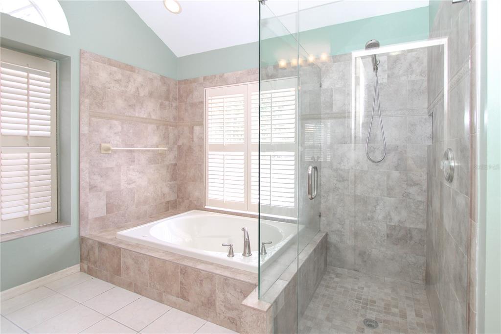 2319 Sunview Avenue Valrico, FL 33596 - Photo 15 of 41 a bathroom with a bathtub and shower