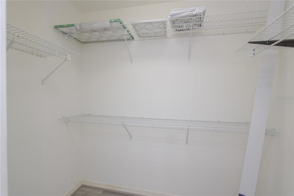 2319 Sunview Avenue Valrico, FL 33596 - Photo 18 of 41 a view of a room with racks on the wall